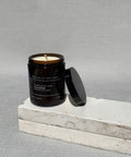 Pancakes soy candle by house of two trees, amber glass jar with a black lid and a cream label