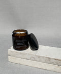 Pancakes candle with the lid off, showing the cotton wick and natural soy wax