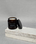 English gentlemen candle with the lid off, showing the cotton wick and natural soy wax
